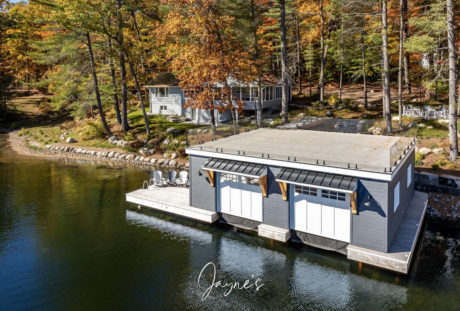 Charming lakeside boathouse with private dock and serene views