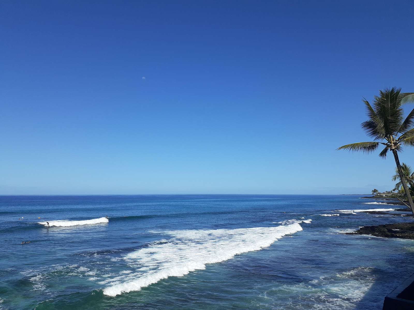 Sparkling day views. Watch the surfers and, you may see a whale in winter!