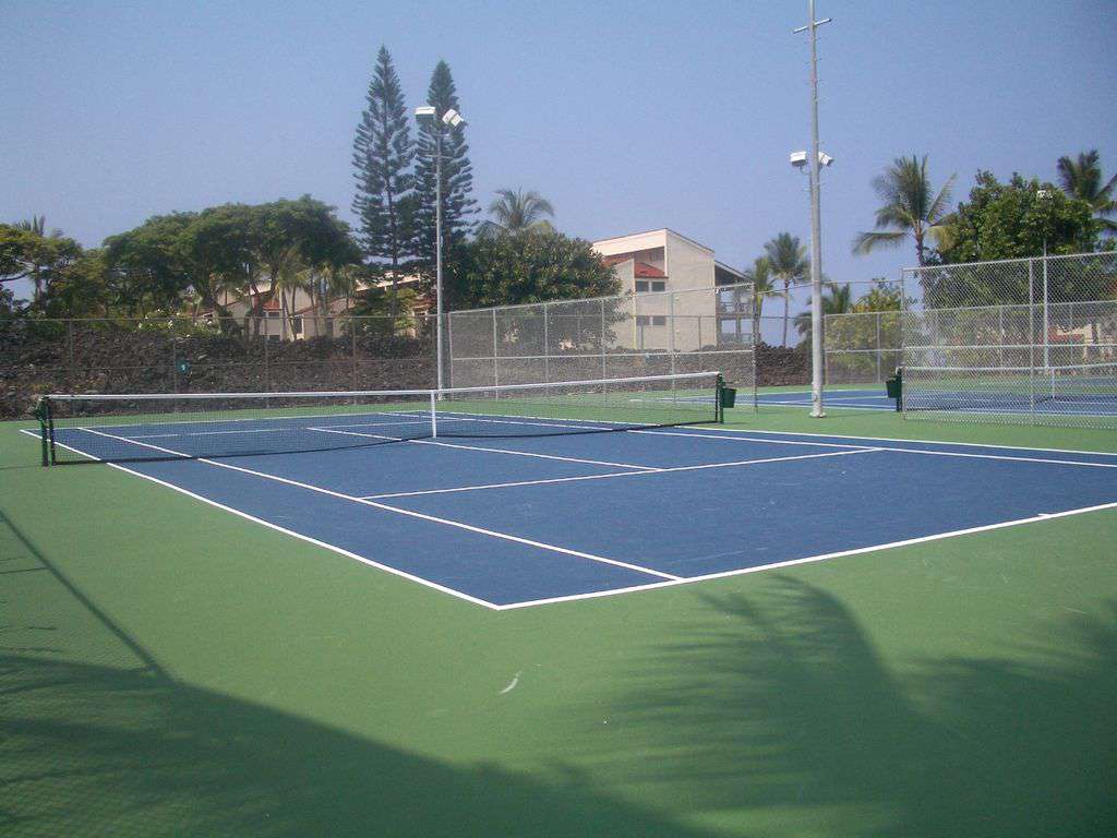 There are 3 lighted tennis courts at Surf & Racquet, new resilient surface.