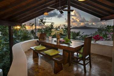 Sunset dining with panoramic views in cozy covered patio