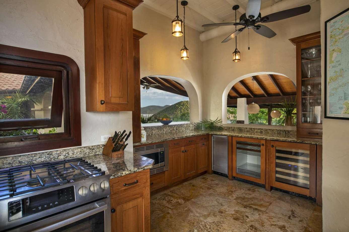 Sunlit kitchen with rustic charm and modern amenities