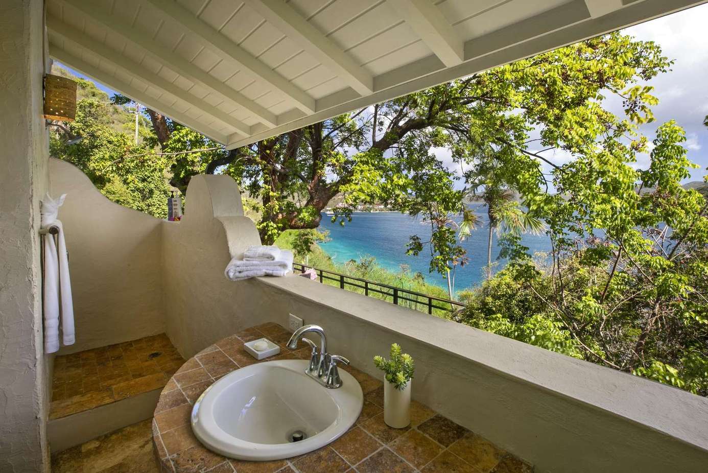 Secluded balcony with serene water views and fresh air