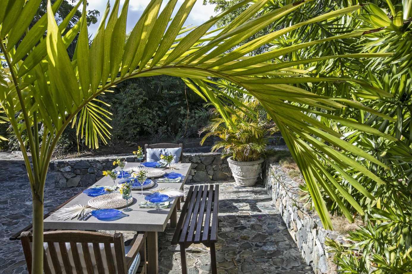 Lush outdoor dining oasis perfect for al fresco meals