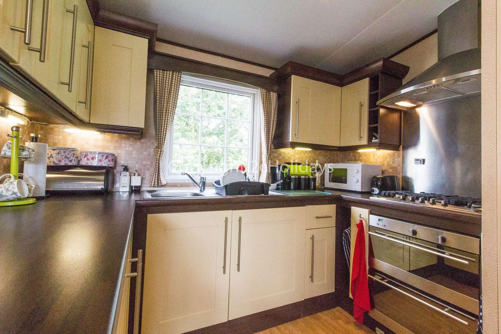 Great kitchen area in this caravan for hire.