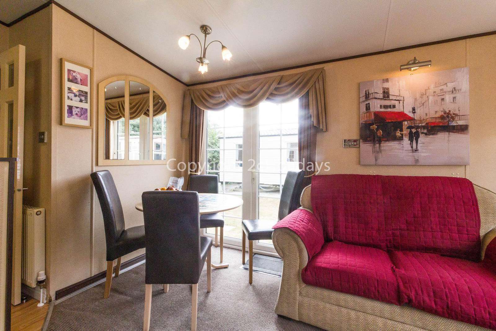 Dining area in this caravan for hire at Breydon water.