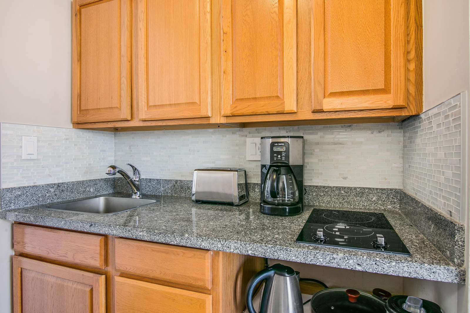 Stove top, Coffee maker, Toaster and pots a& pans included