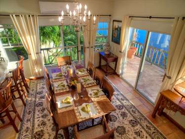 Spacious dining room with garden views and natural light