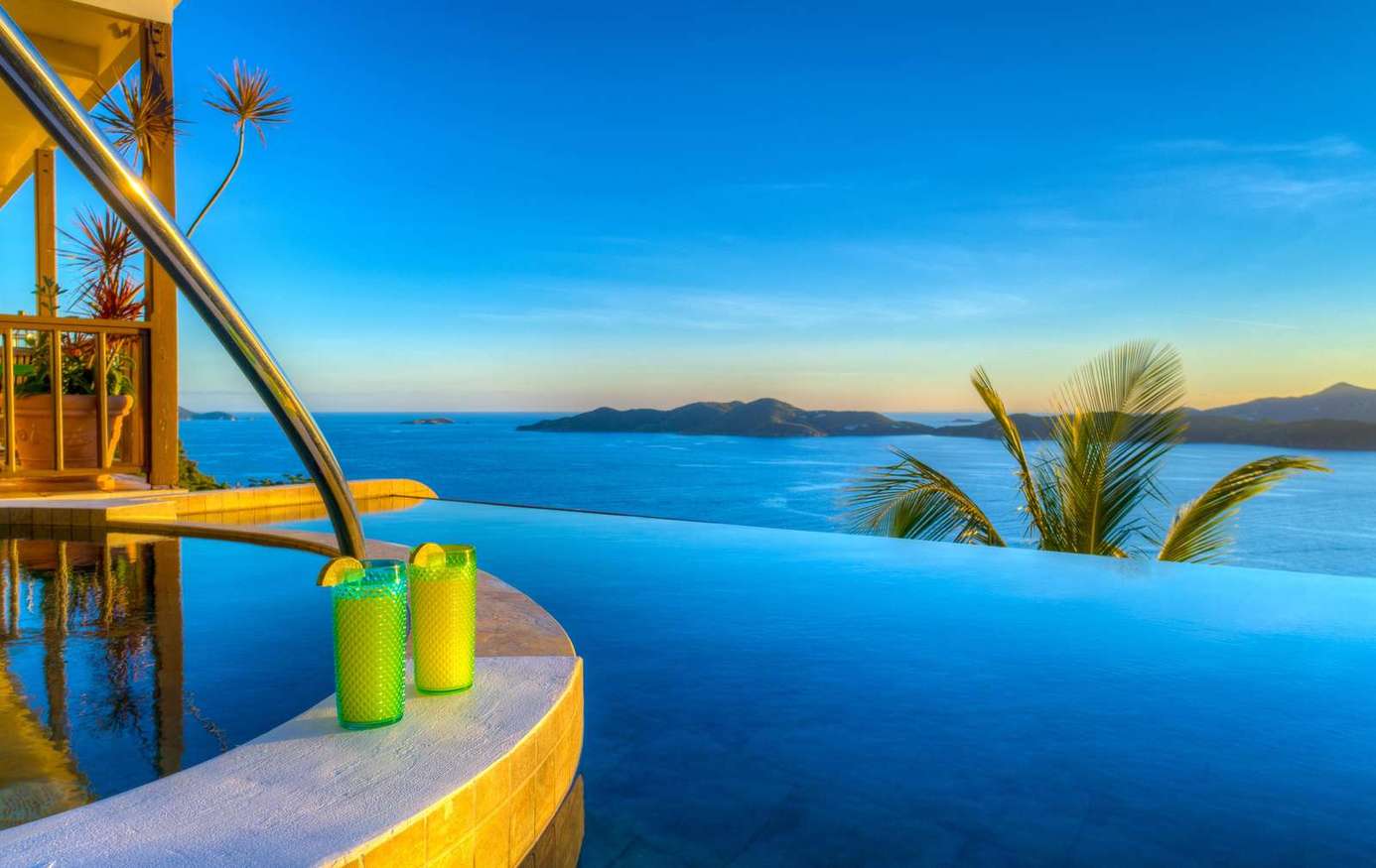 Infinity pool with stunning ocean views and tropical vibes