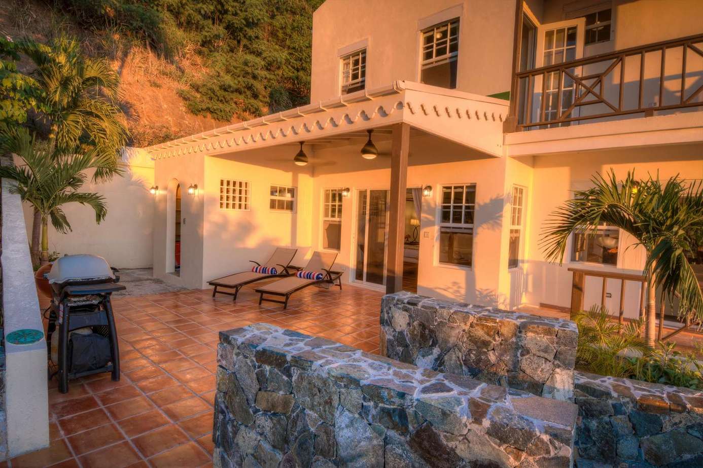 Spacious patio with cozy seating and mountain views