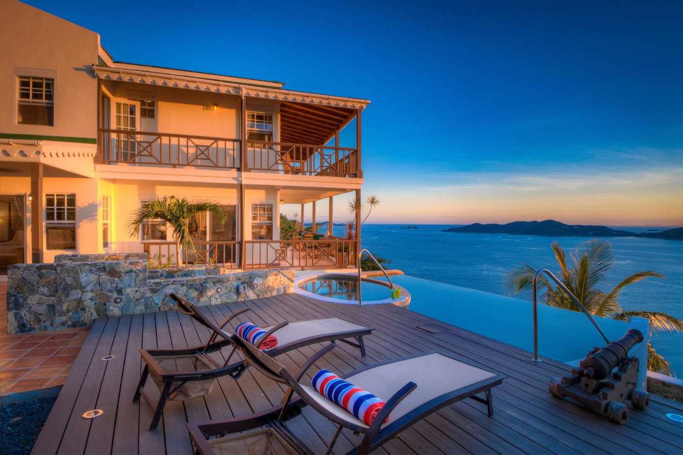 Sunset views from the spacious oceanfront patio with pool