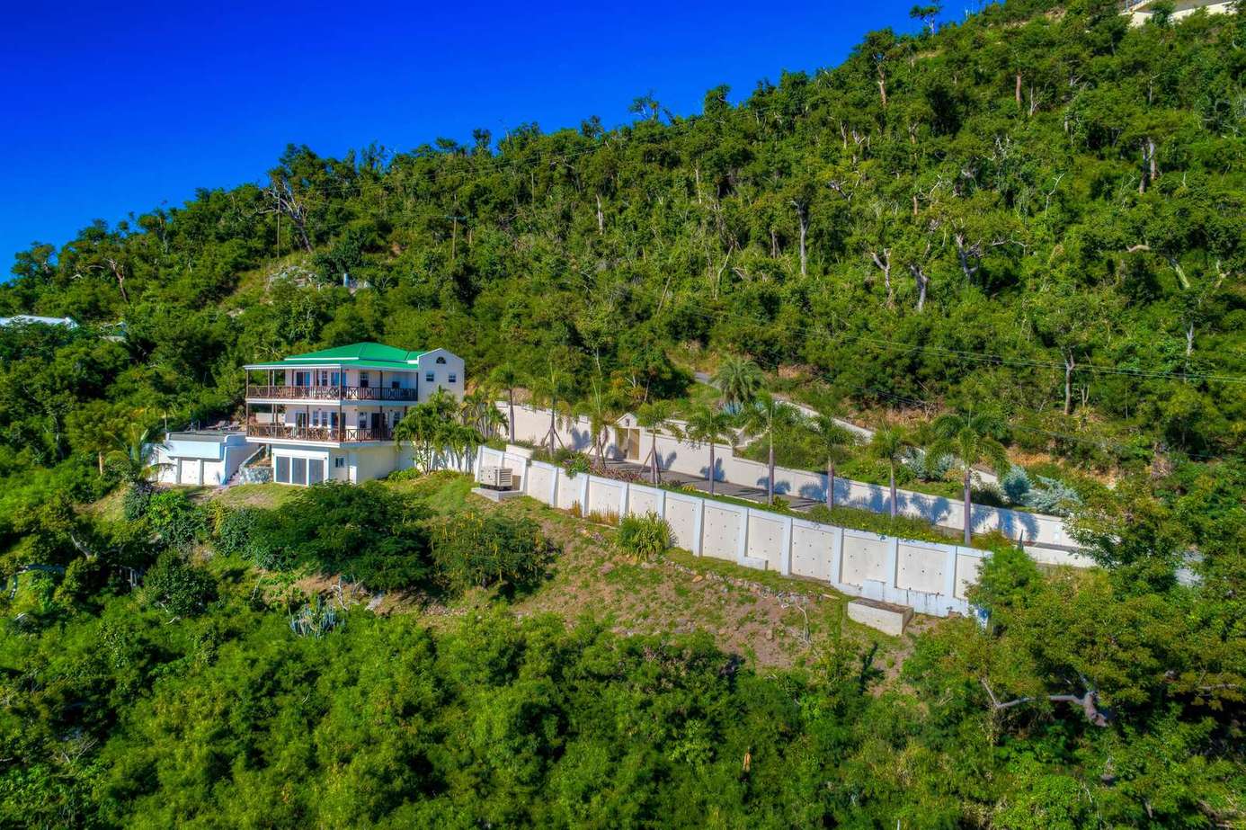 Secluded hillside retreat with panoramic forest views