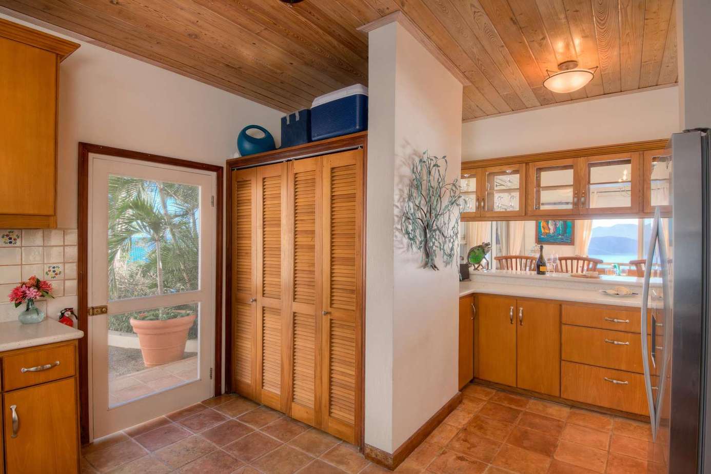 Cozy kitchen with warm wood accents and garden access