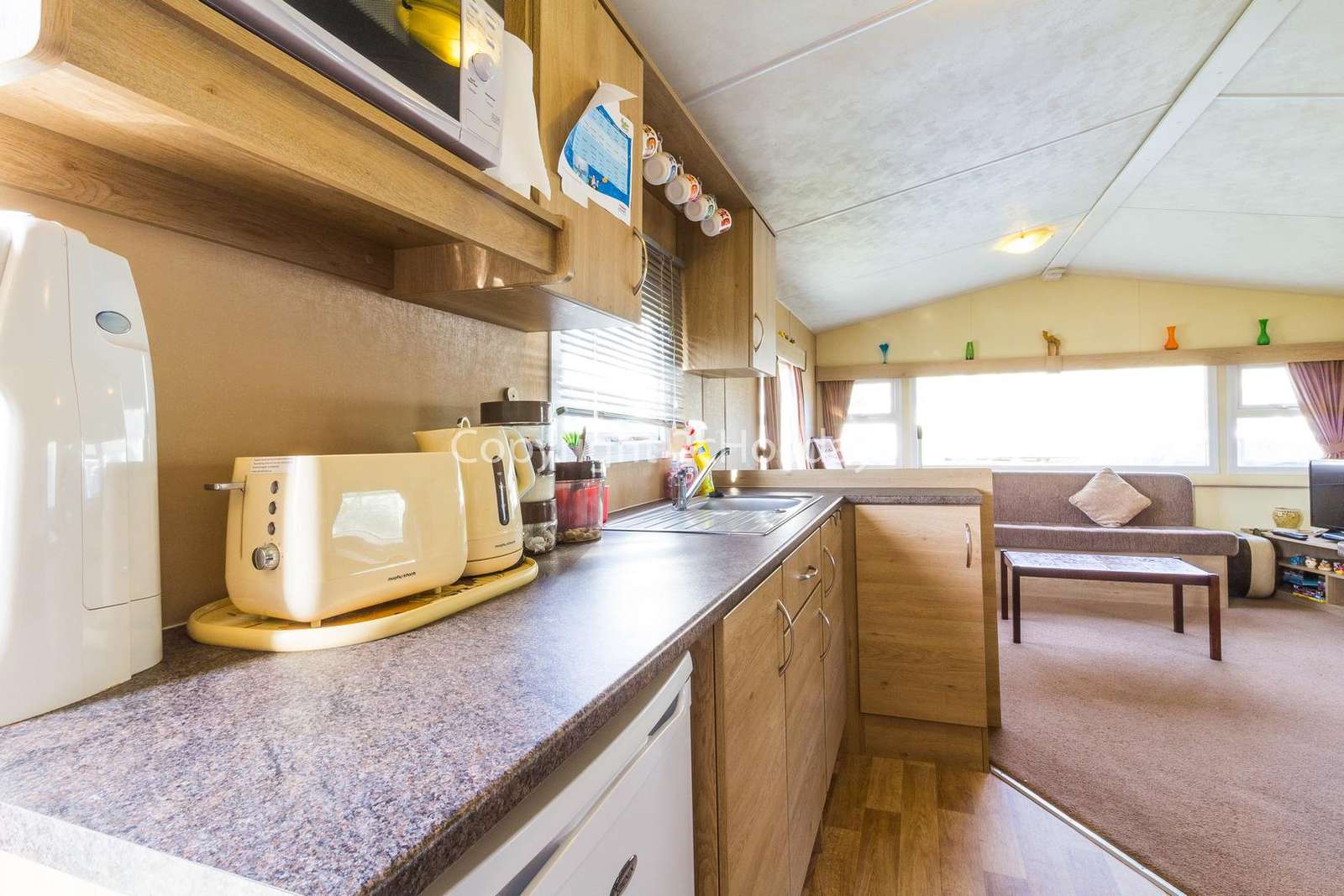 Spacious cooking area with plenty of storage cupboards