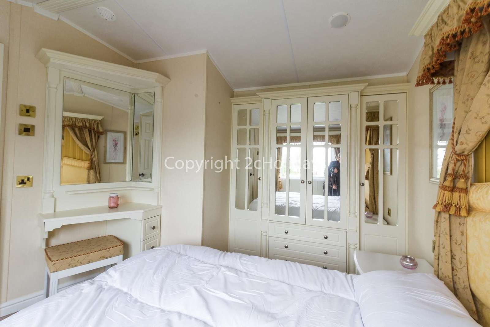 You can find plenty fo storage space in this master bedroom!