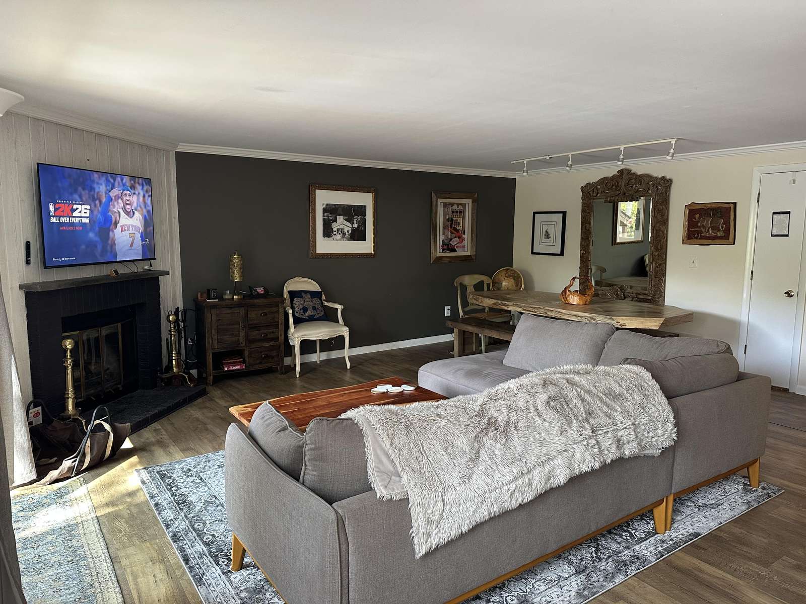 Cozy living room with fireplace and spacious seating area - property