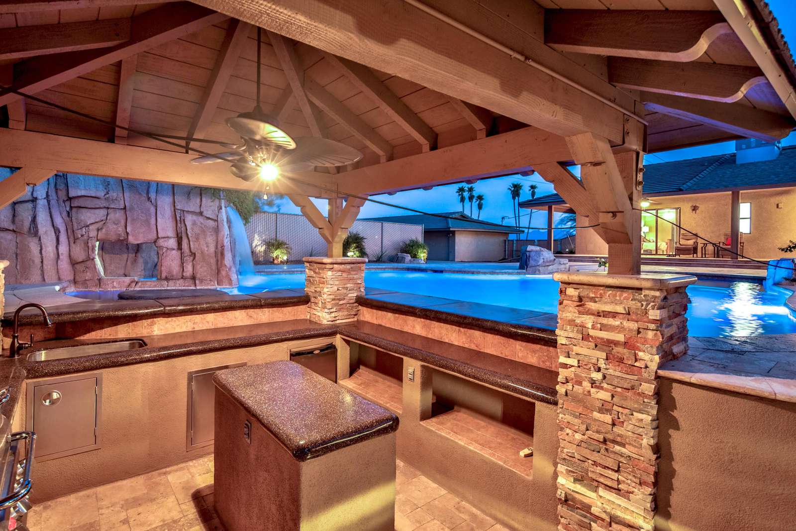 Stay Cool while cooking surrounded by misters and the pool