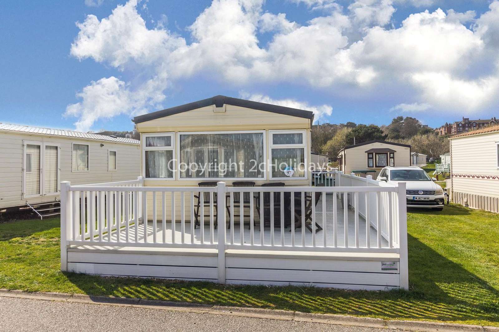 Large wrap around decking area with outside furniture to relax in the sunshine!