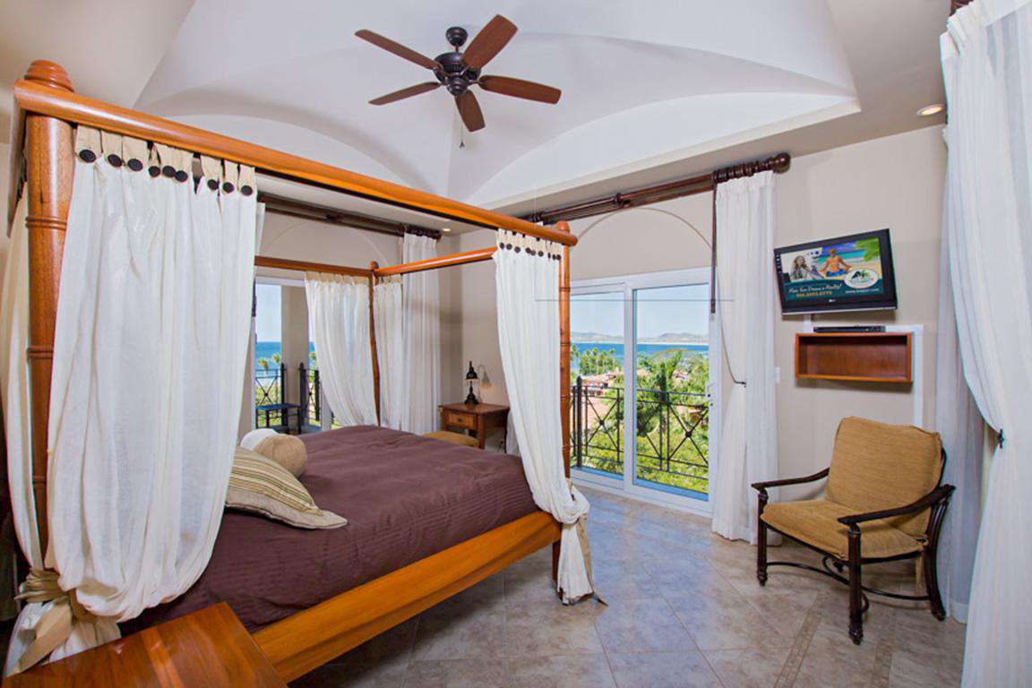 Another view of the master bedroom, king bed