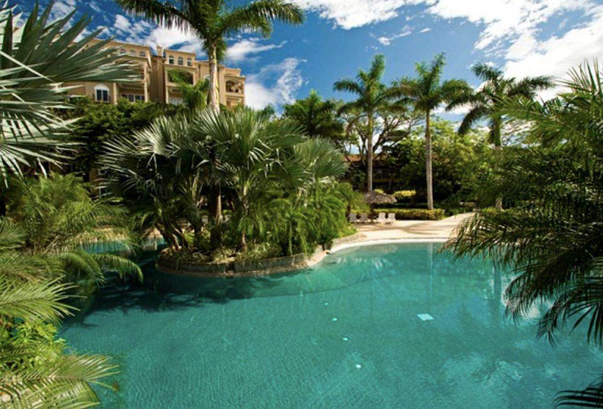 View of the 10,000 SF free form pool at the Diria Resort, just outside the condo