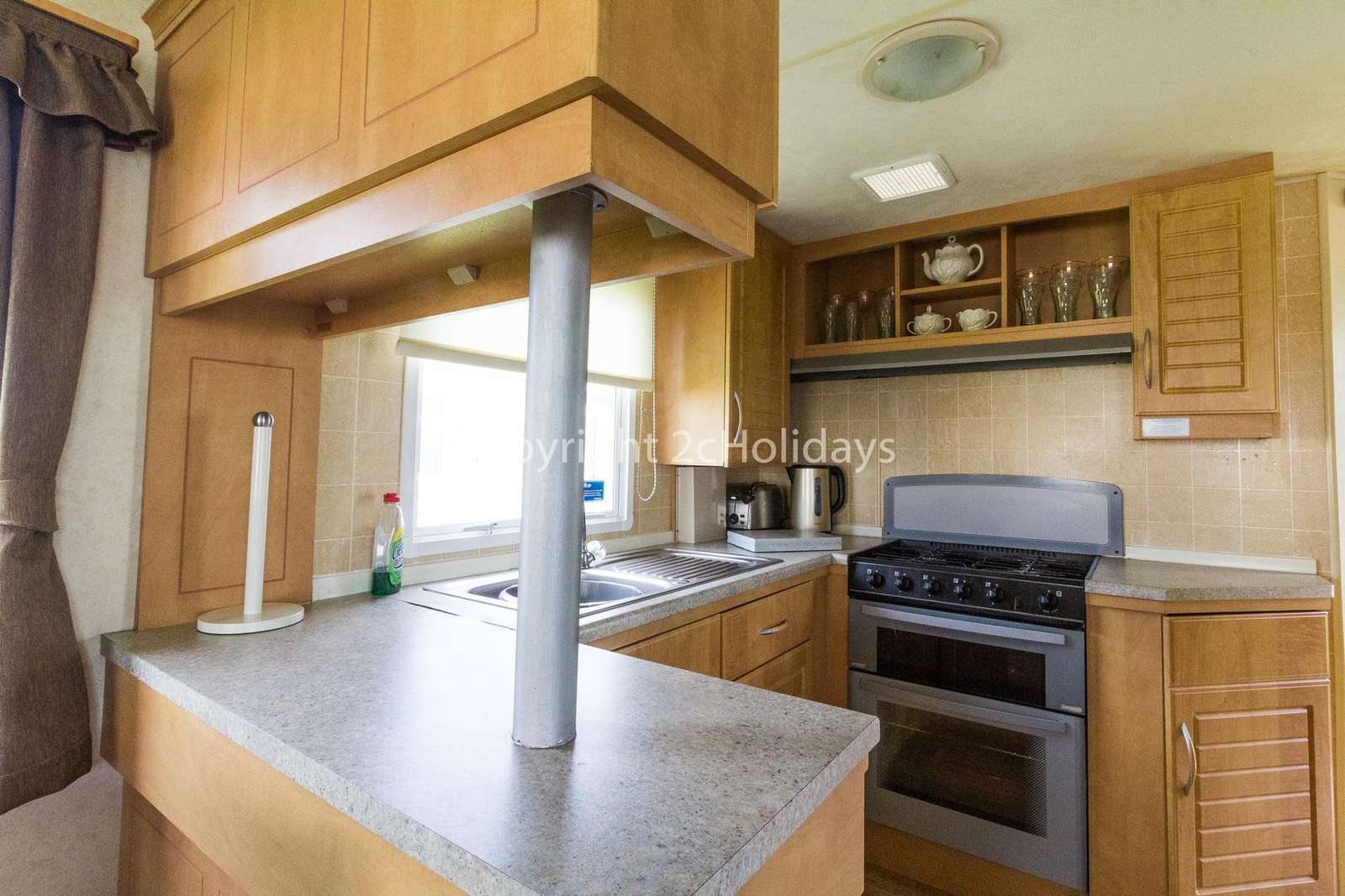 Kitchen inlcudes a full size oven!