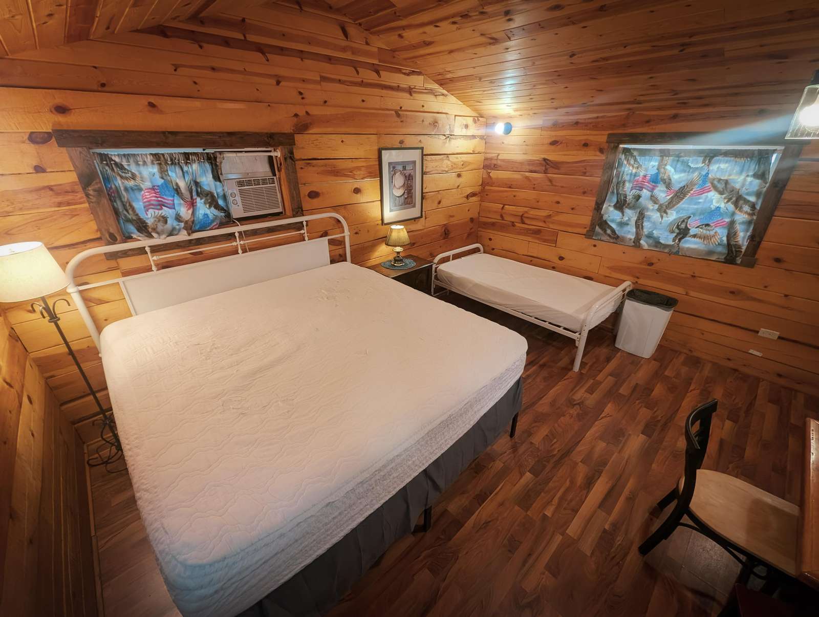 Just bring your own sleeping bag or blanket. We provide the rest! This cabin sleeps up to 3 (king/twin). - property