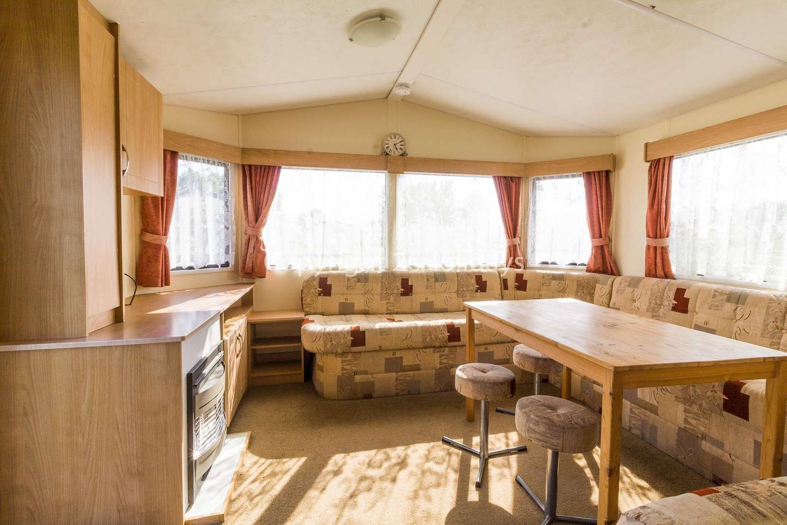 This cosy lounge includes a TV and a gas fire!
