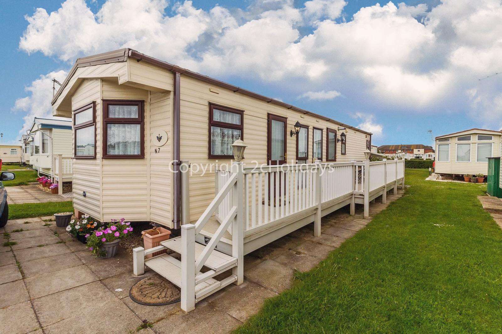 Large decking area with outside furniture to enjoy use of!