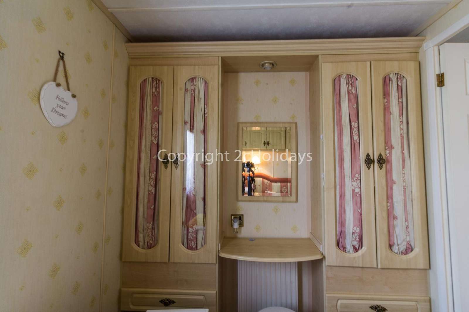 There's plenty of storage in this twin bedroom