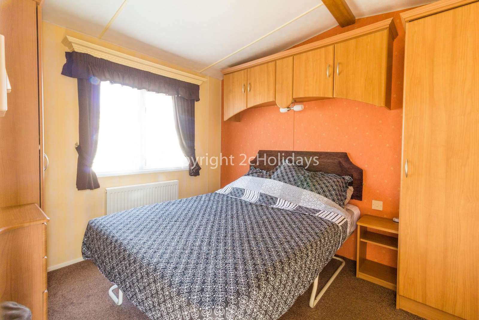 You can find plenty of storage in this master bedroom!