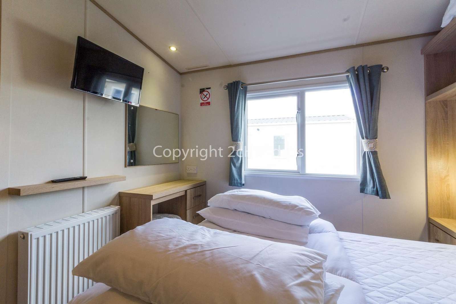 You can find a TV in this master bedroom!