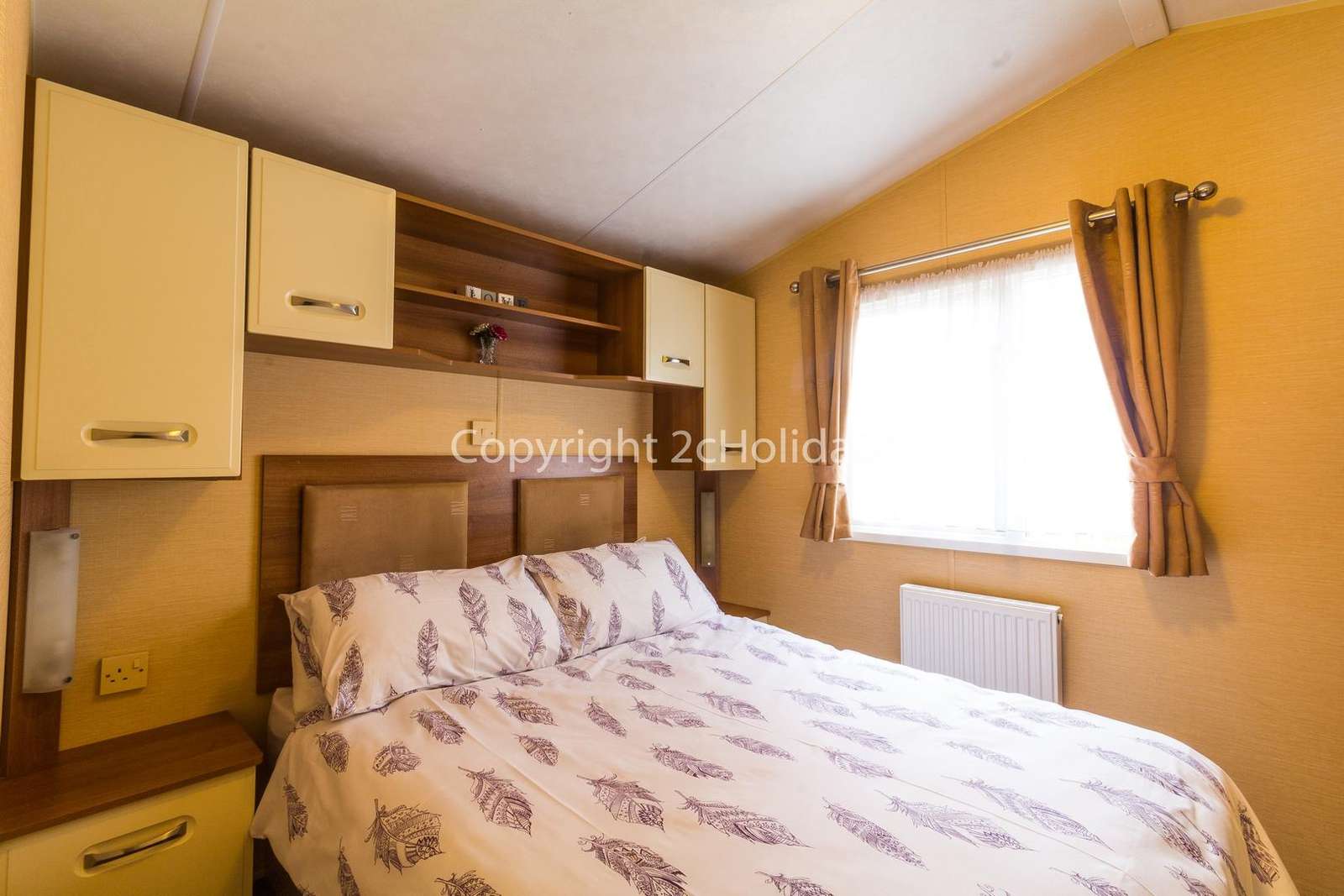 Great size master bedroom with a TV!