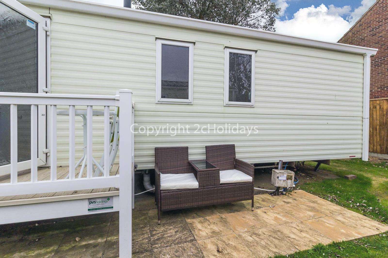 Outside gated decking with outside furniture for you to enjoy use of