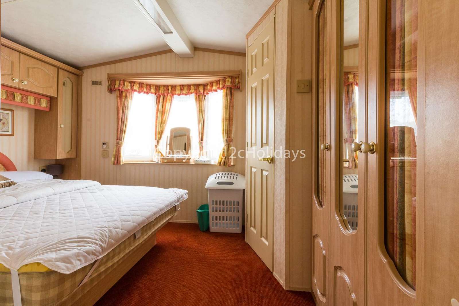 You can find plenty of storage in this master bedroom!