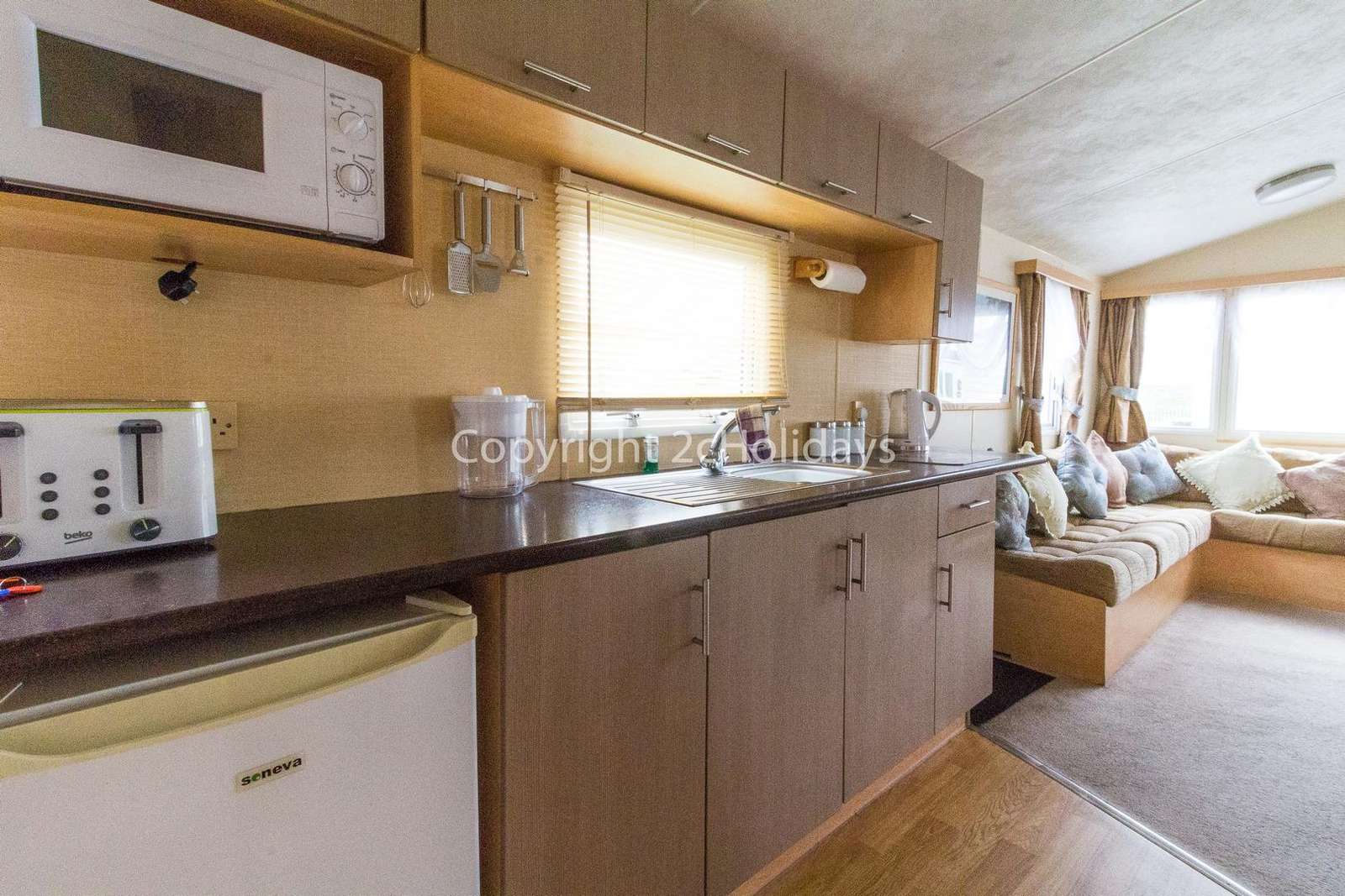 This kitchen includes a full size oven!