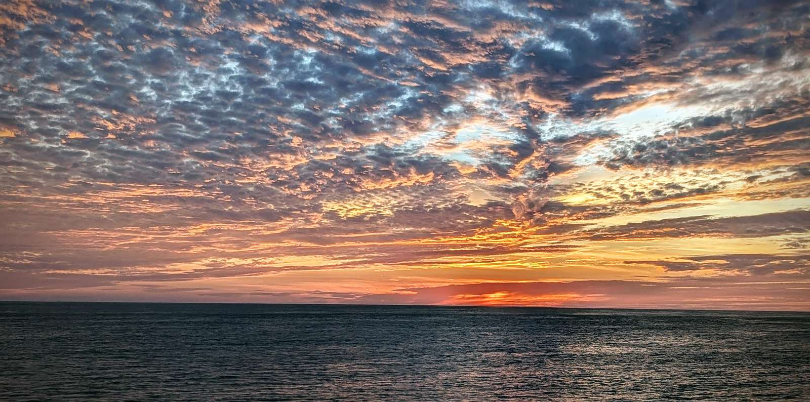 Breathtaking ocean sunset views for serene evenings - property