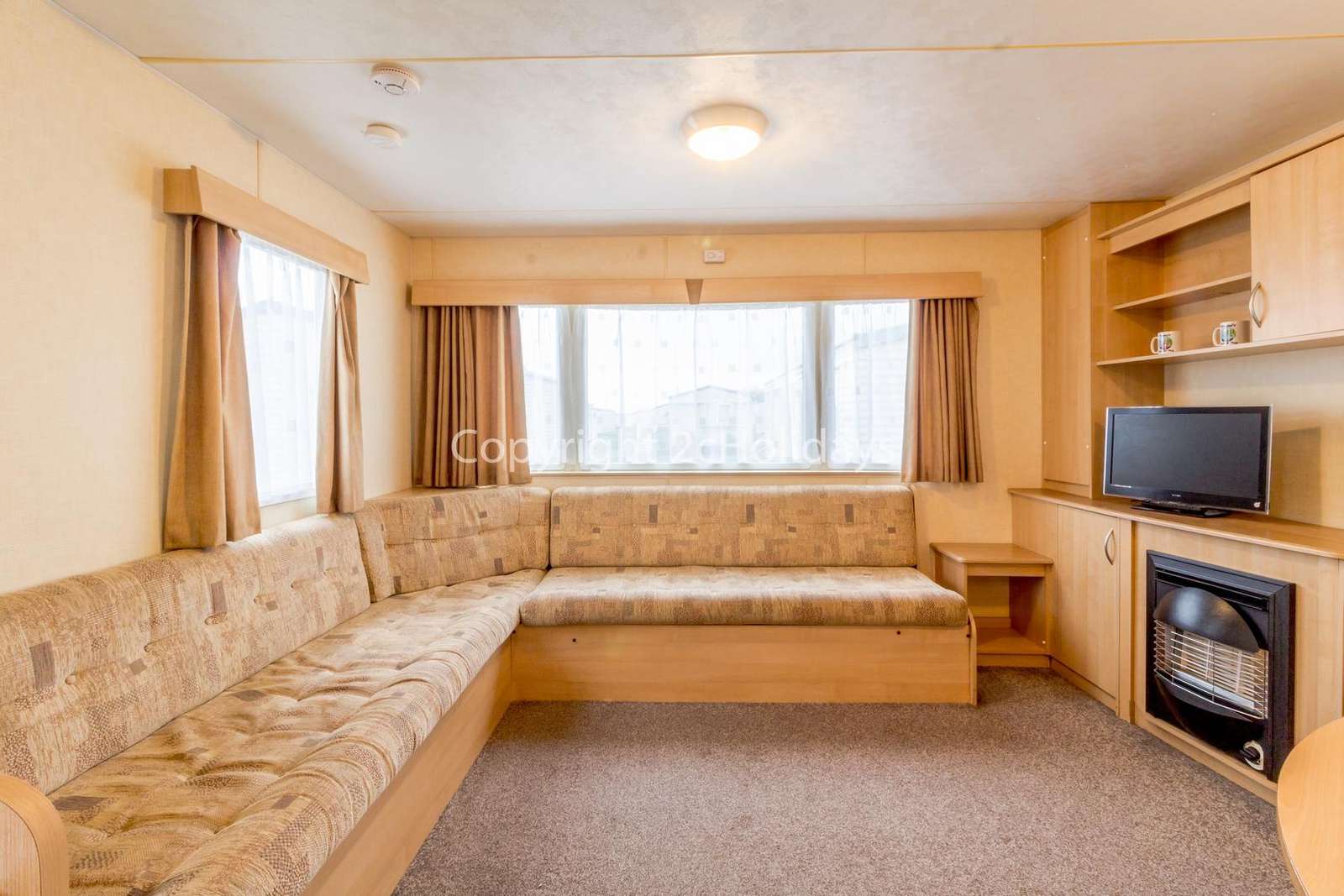Spacious lounge with a TV/DVD player and gas fire!
