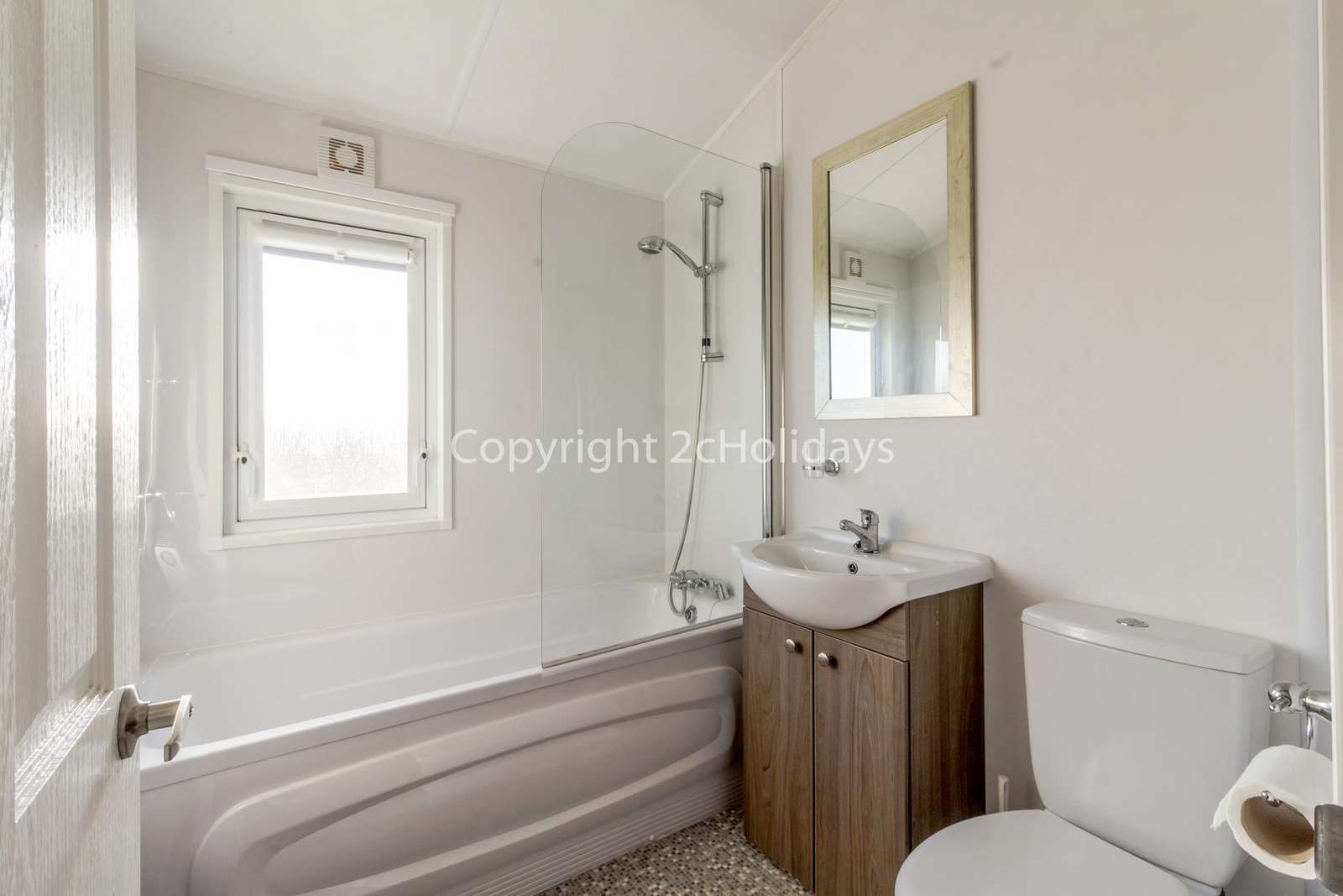 Spacious family washroom with a bath!
