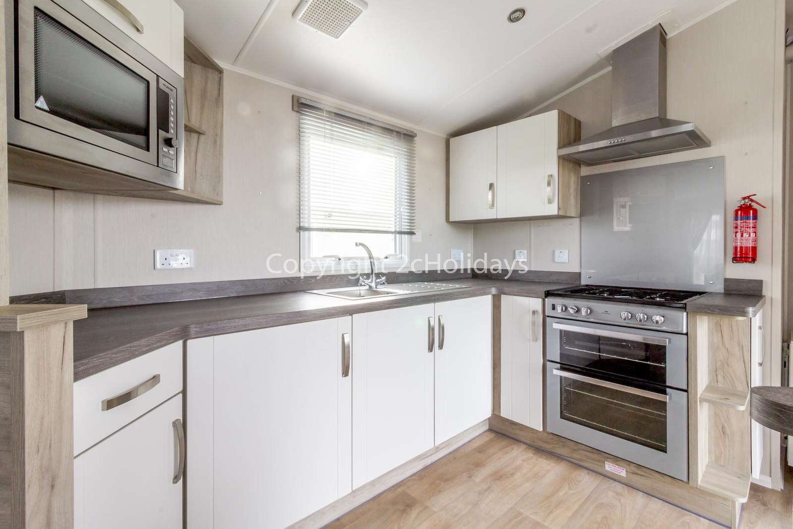 The kitchen includes a full size oven!