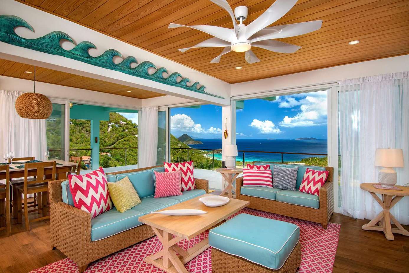 Bright and airy living room with ocean views and vibrant decor