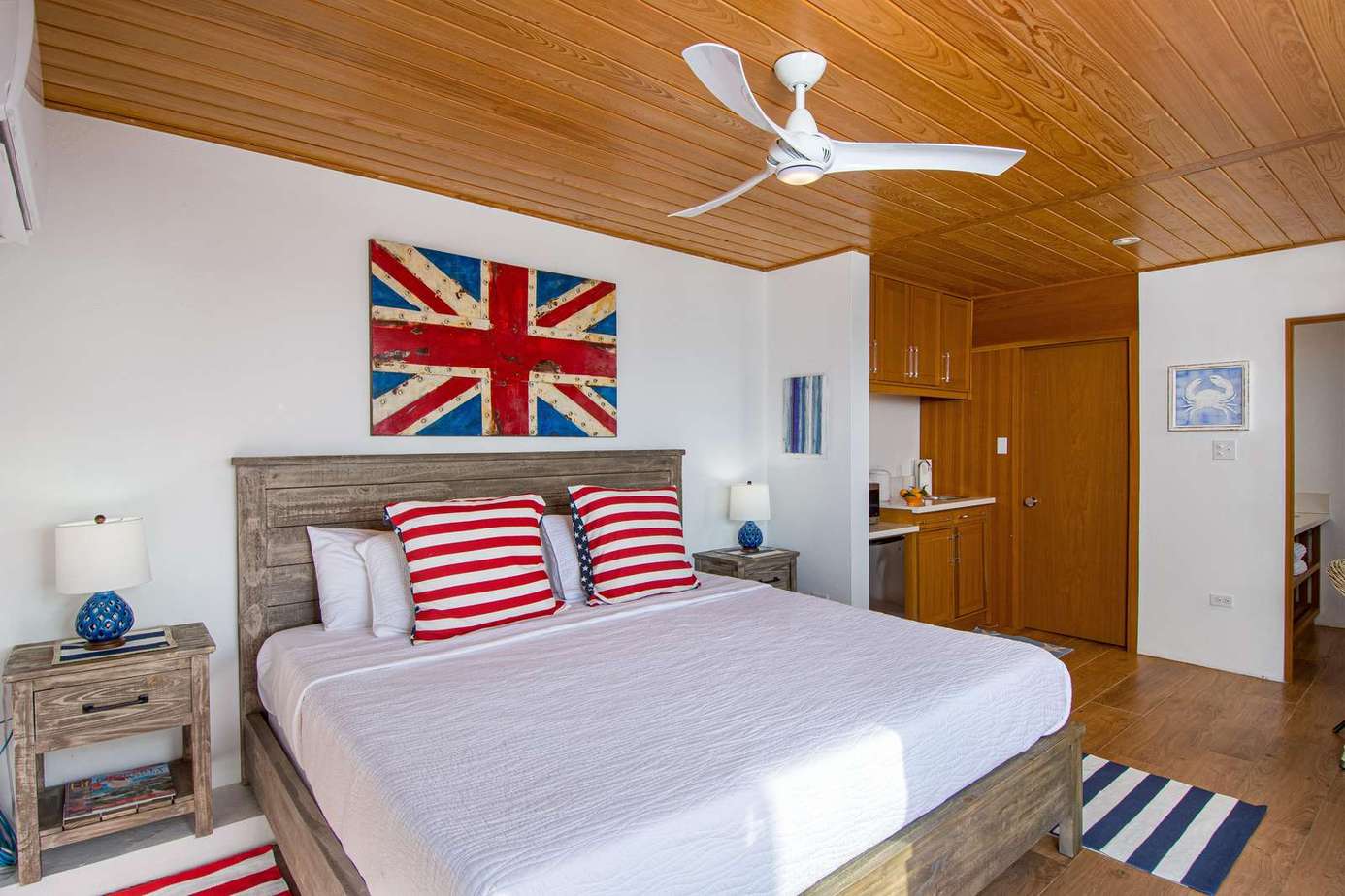 Bright, airy bedroom with nautical charm and cozy comfort