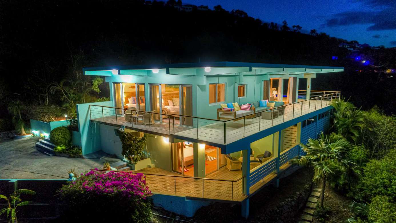 Spacious multi-level home with glowing evening ambiance