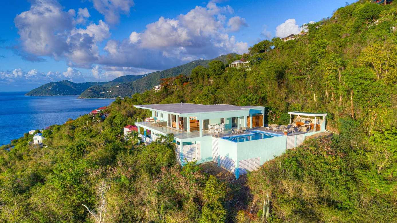 Secluded hillside villa with panoramic ocean views and infinity pool