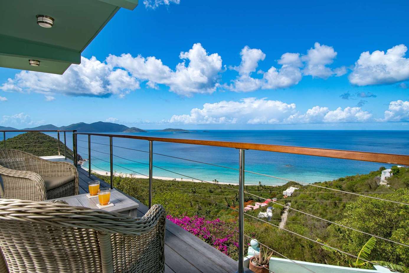 Oceanfront balcony with panoramic sea and island views