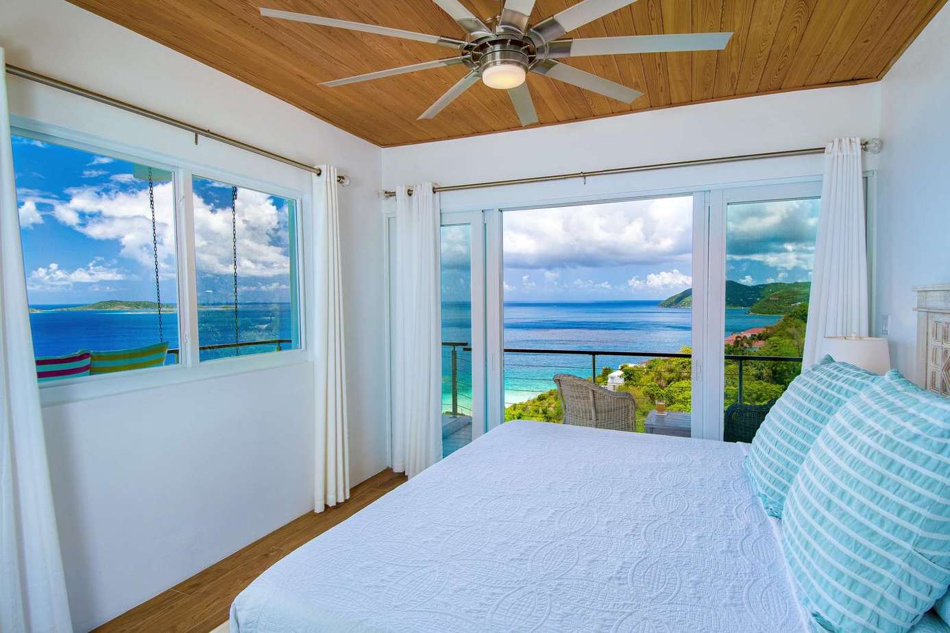 Ocean-view bedroom with serene coastal breeze and natural light