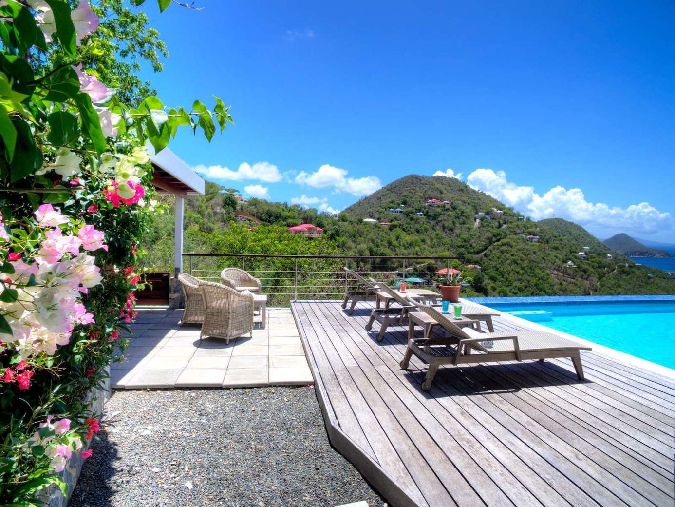 Sun-soaked pool deck with stunning mountain views