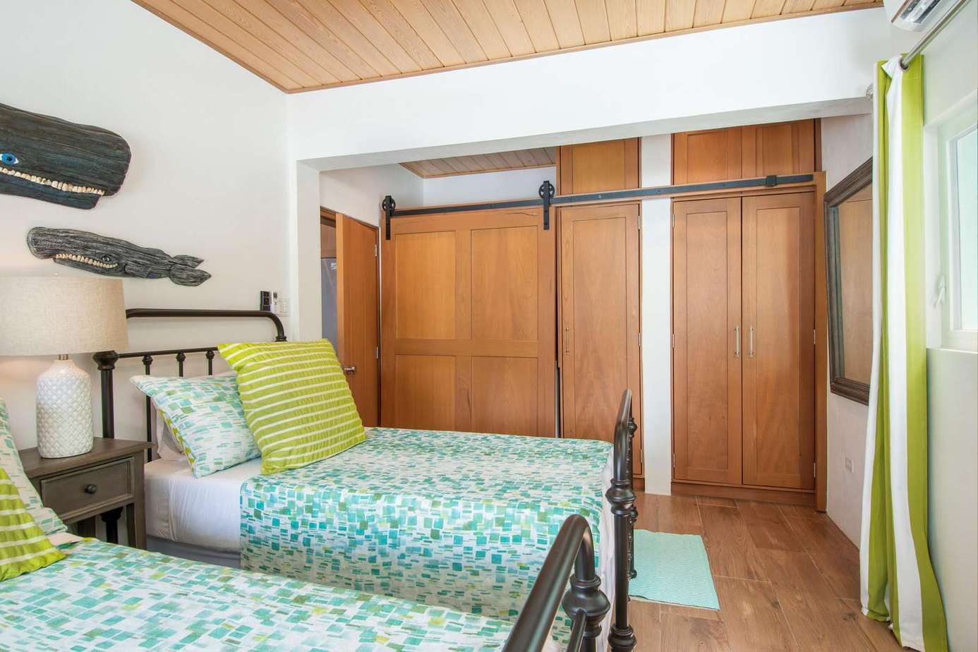 Cozy bedroom with vibrant accents and ample closet space