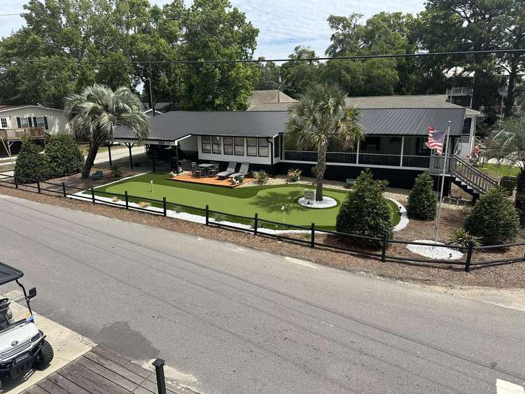MH122 3bdrm/2bath with futon, limo golf cart, Putting green, corn boards Preview 0