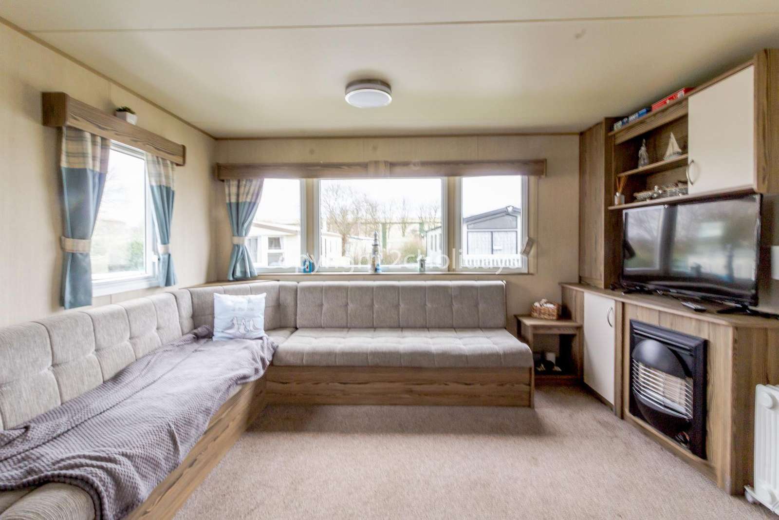 Spacious lounge with a TV and gas fire!