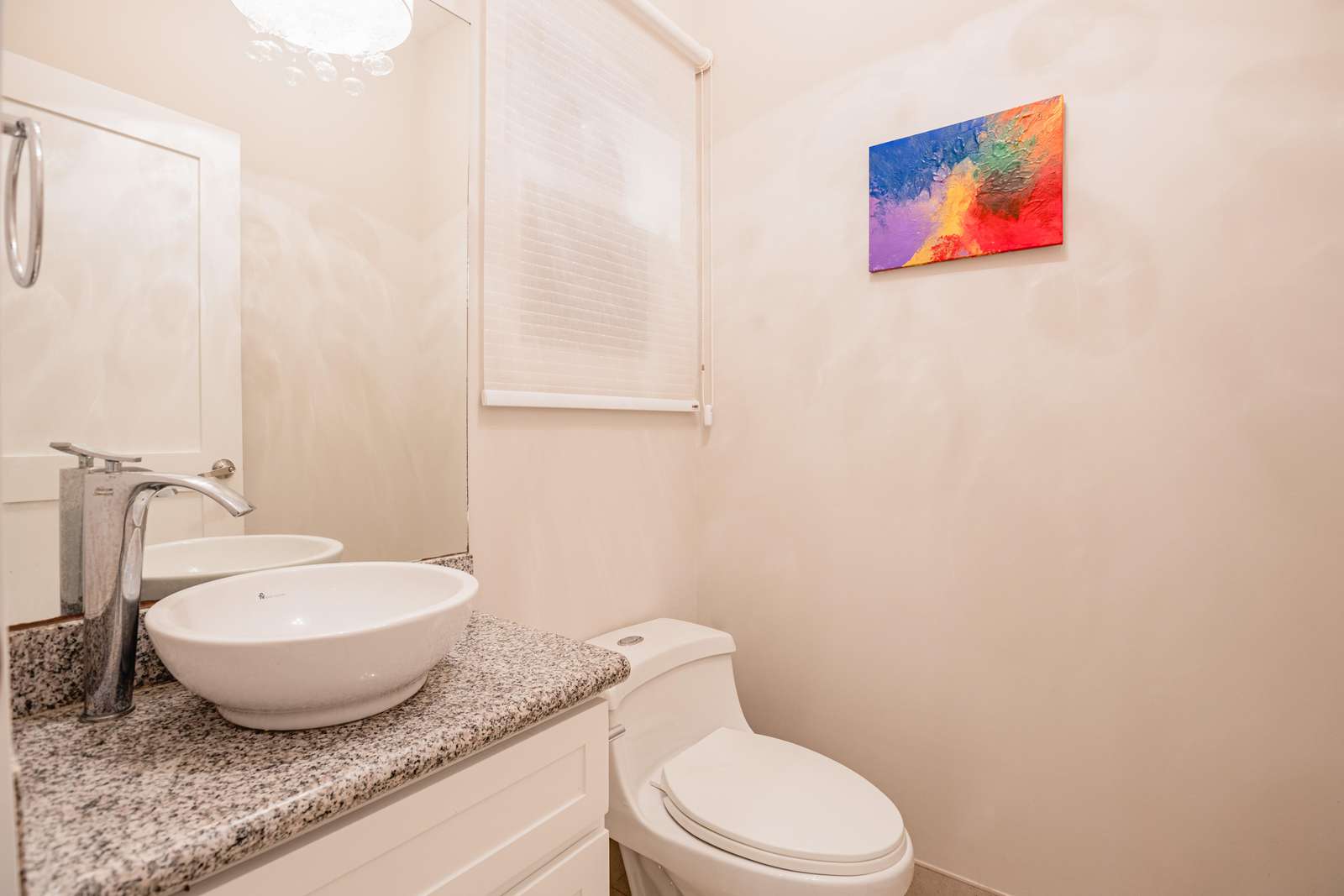 Guest half bathroom off the main entrance