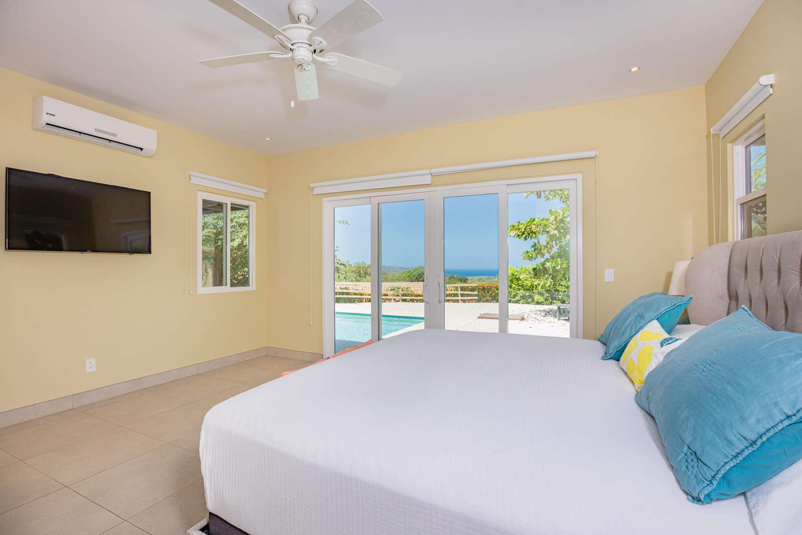 Master Bedroom, King bed, Full private bathroom, access to pool, terrace area